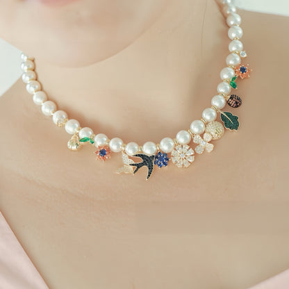 Whispering Swallow Pearl Necklace